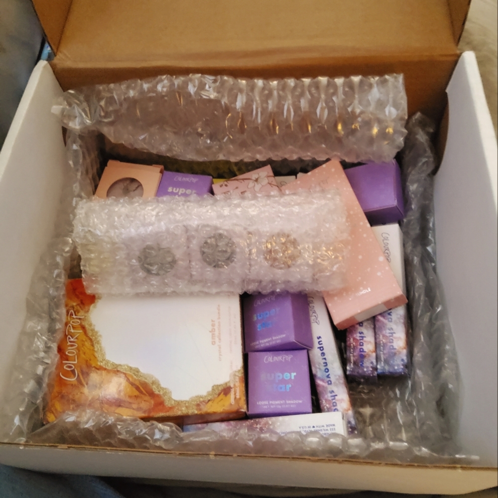 Box of new colourpop makeup.